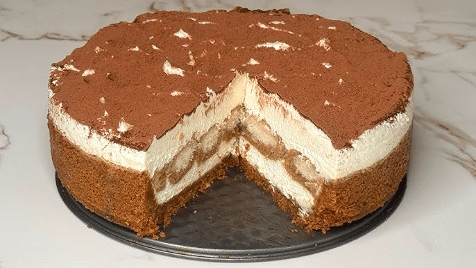 Cheesecake de tiramisú receta,postres virales 2026,repostería tendencia TikTok,receta tiramisú fácil,ingredientes cheesecake tiramisú,gastronomía digital,repostería artesanal,cómo hacer pastel de queso y café,tendencias comida Instagram.